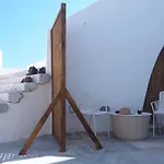 The Palm Rock, Santorini